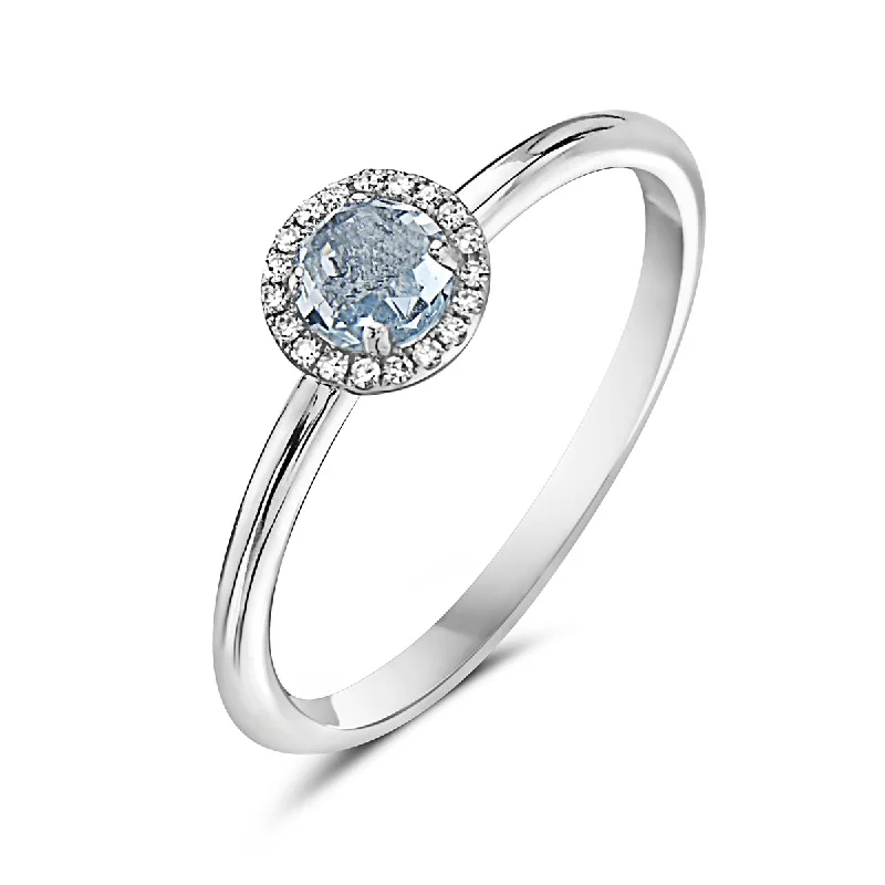 Elegant Engagement Rings For Meaningful Proposals-Aquamarine And Diamond Halo Ring